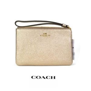 NWT Coach Gold Leather Wristlet